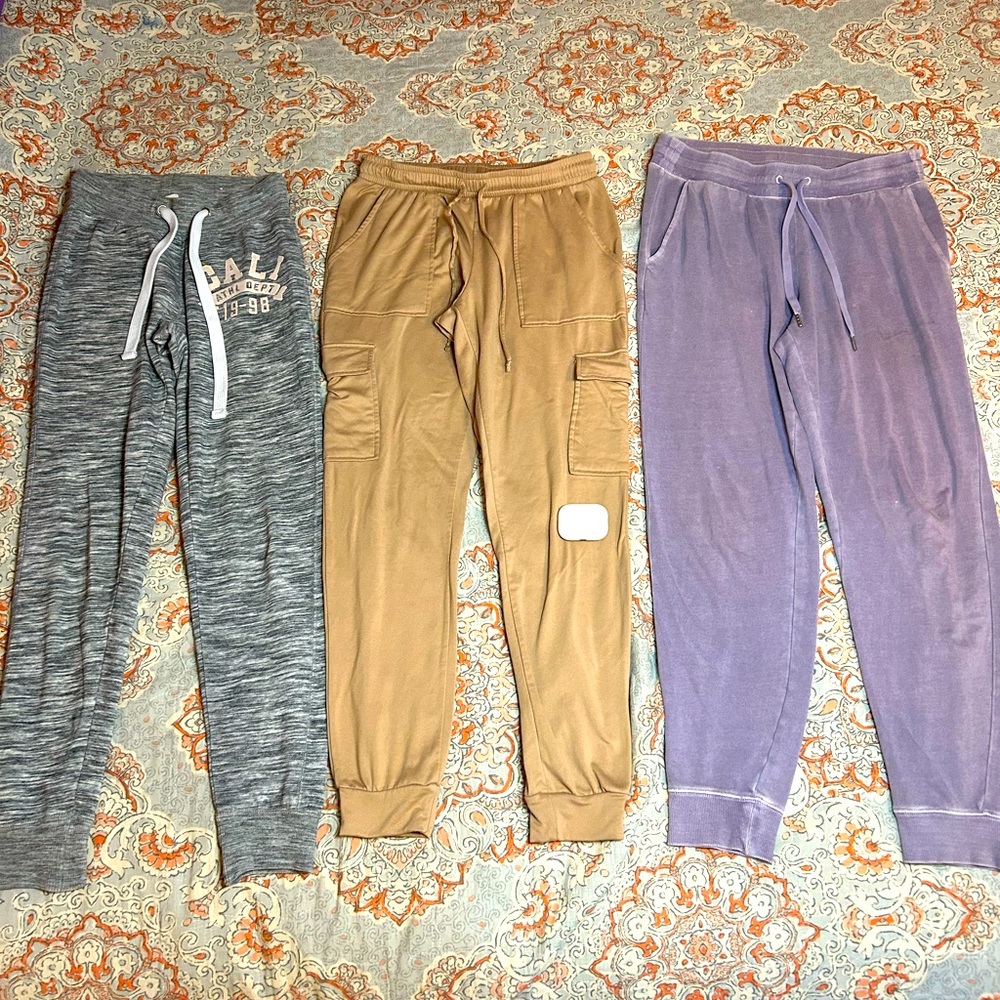 3 Women's joggers in purple, gray, and tan